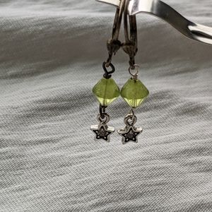 Green dangle star earrings